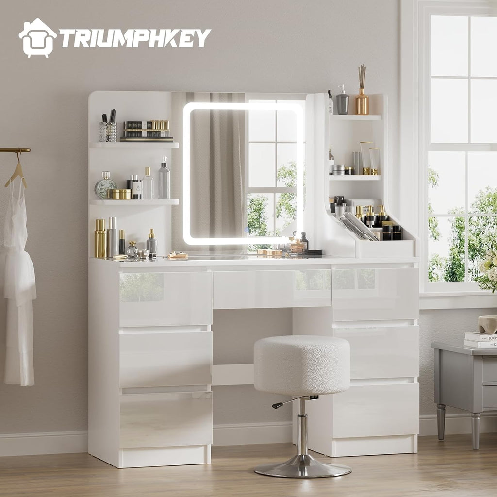 TRIUMPHKEY Coiffeuse Moderne Blanc Haute Brillance, Miroir LED à Lumière Réglable, Grand Espace de Rangement,Table de Maquillage avec 7 Tiroirs, 3 Compartiments, 4 Étagères Ouvertes